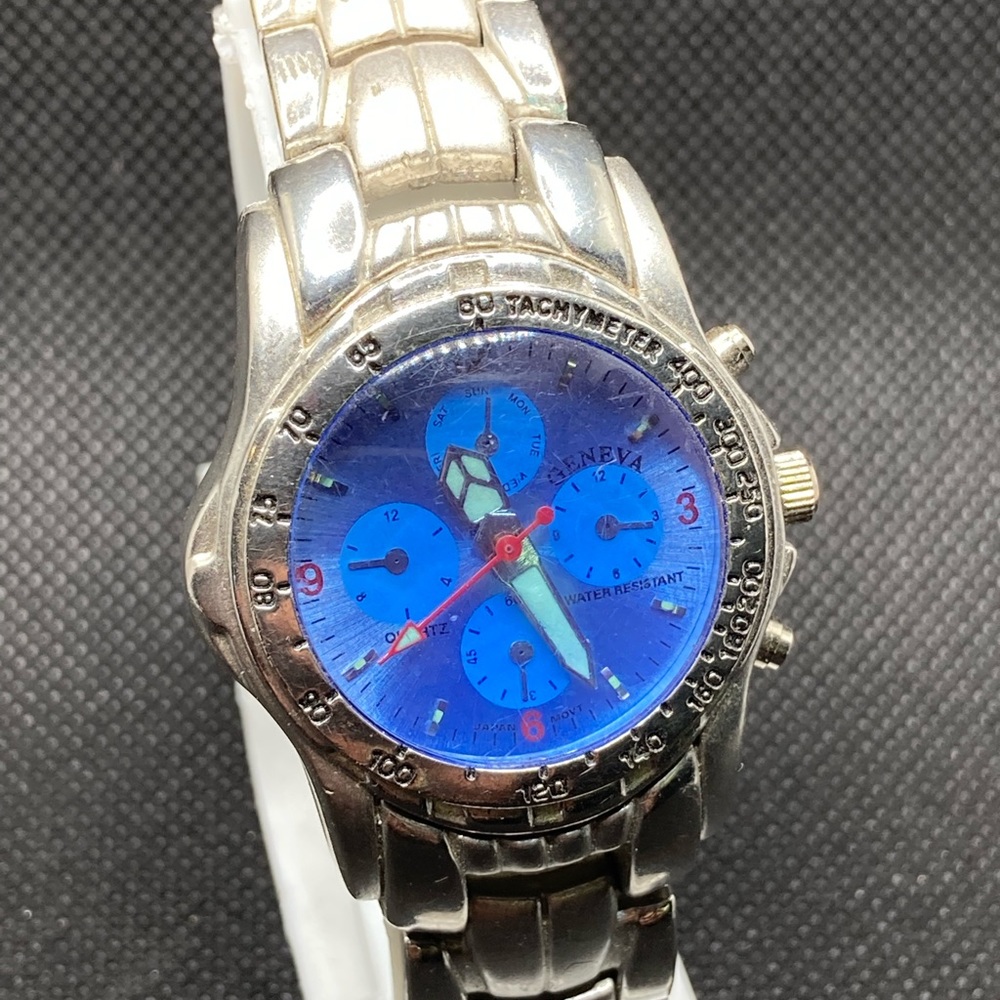 Ladies watch silver with blue dial 32 mm chronograph with stopwatch.